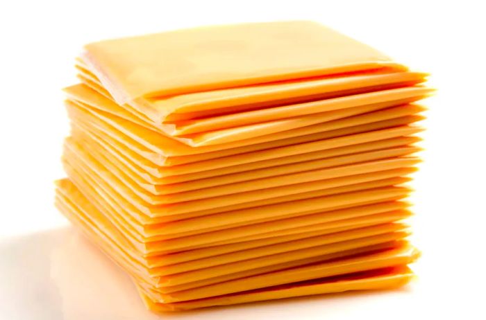 Stack of Sliced American Yellow Cheese