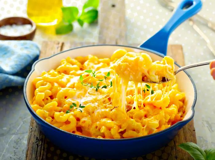 Baked mac and cheese served in a cast iron skillet