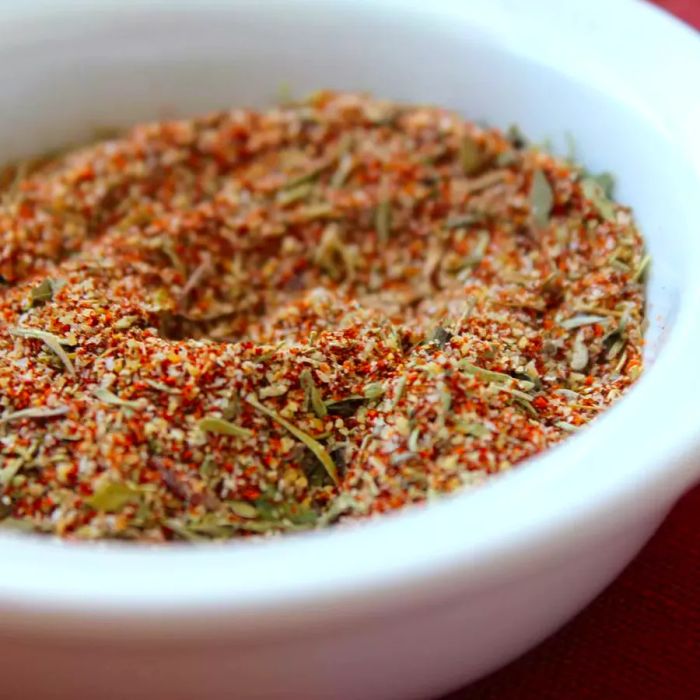 A bowl of homemade blackened seasoning mix