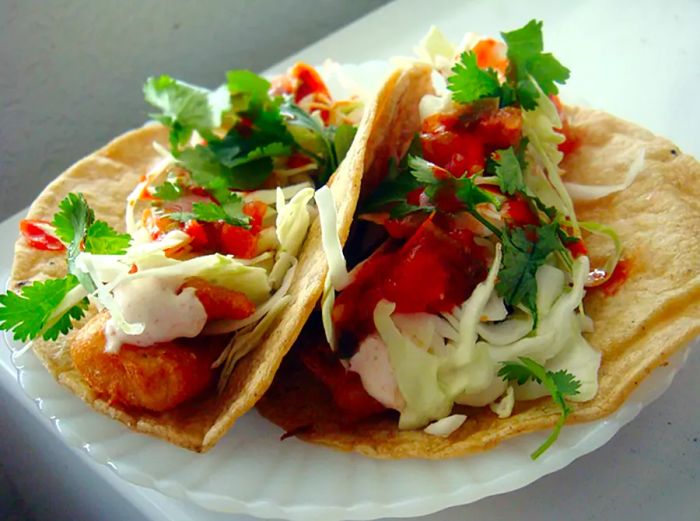 Fish Tacos served on a white plate