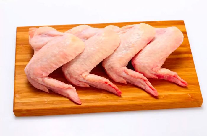 Raw chicken wings.
