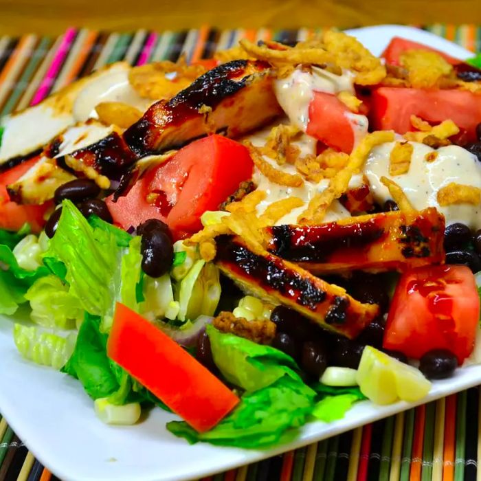 Grilled barbecue chicken salad served on a plate