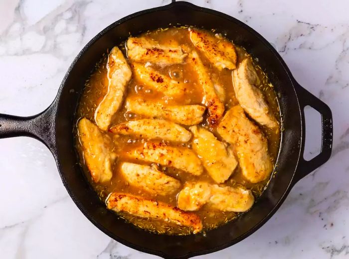 A skillet of Scarpariello chicken