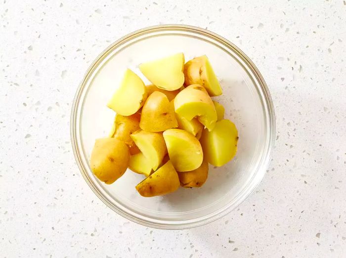 Potatoes in a clear glass bowl