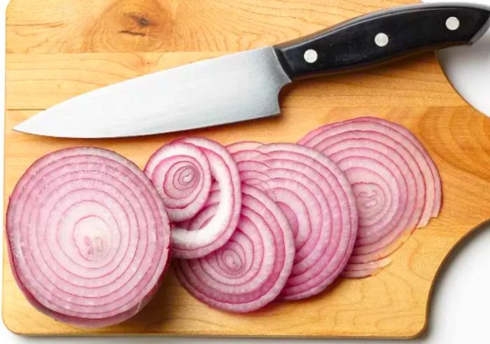 102752803-sliced-red-onion-on-a-cutting-board-Photo-by-Meredith.jpg