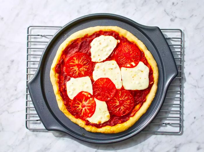 Pizza baked until the edges are golden and crispy.