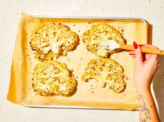 Cauliflower roasted and brushed again with the olive oil mixture