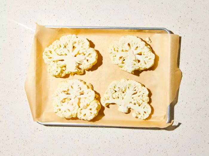 Cauliflower arranged on the baking sheet