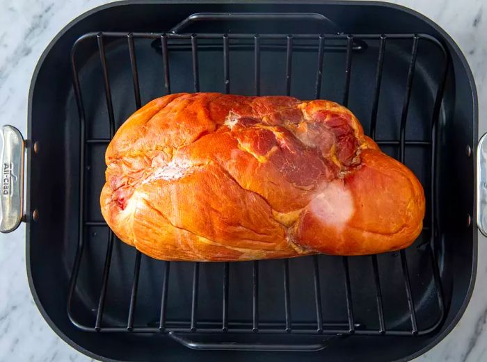 Ham in the roasting pan, ready for baking