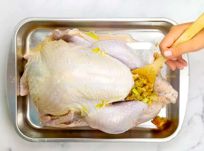 Stuffing the turkey cavity