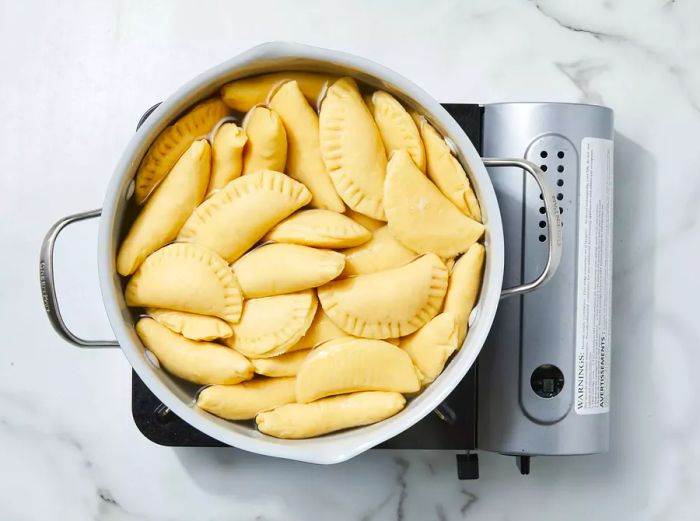 Pierogi are cooked once they float to the top of the pot.