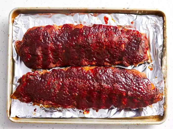 Ribs broiled until the barbecue sauce is bubbling.