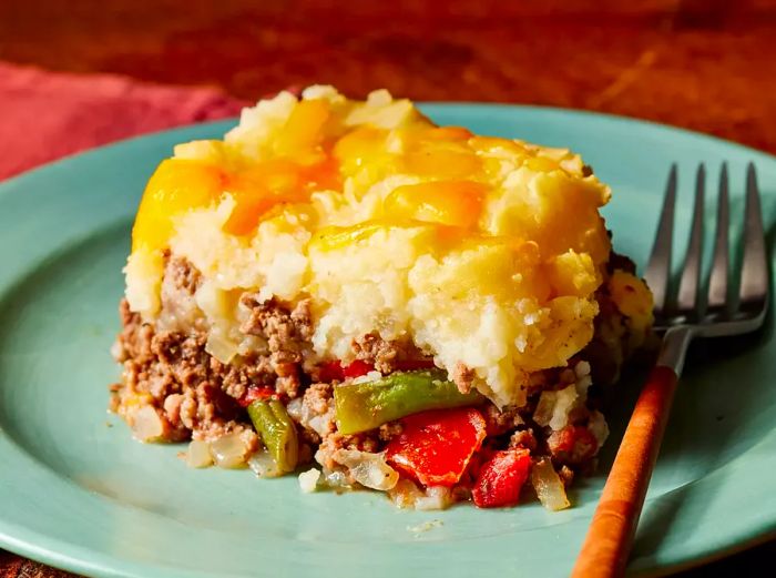 A plated portion of Ground Beef Shepherd's Pie, ready to be served.