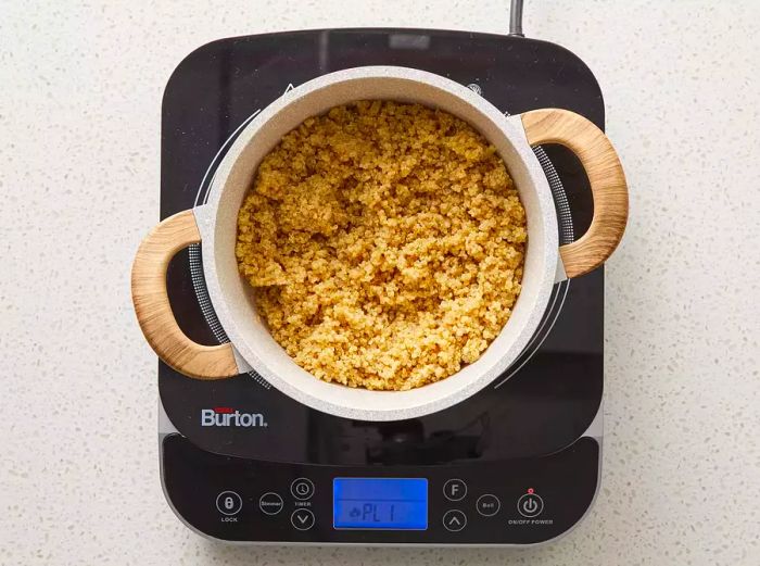 overhead shot of cooked quinoa in a pot