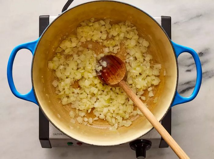 Onions and garlic sautéing until aromatic.