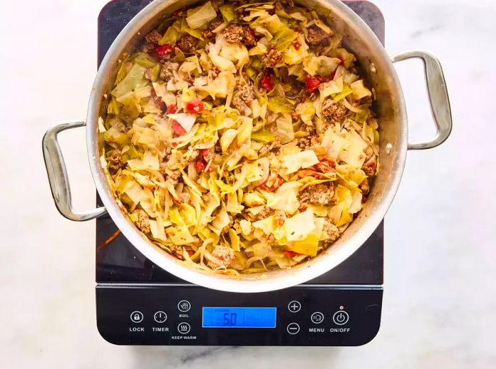 A hearty pot of ground beef and seasoned cabbage