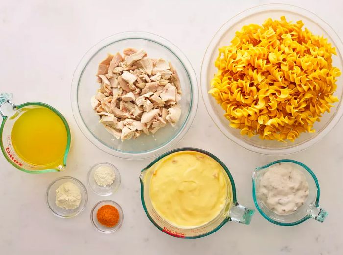 Easy Chicken and Noodles Ingredients on a Clean White Countertop