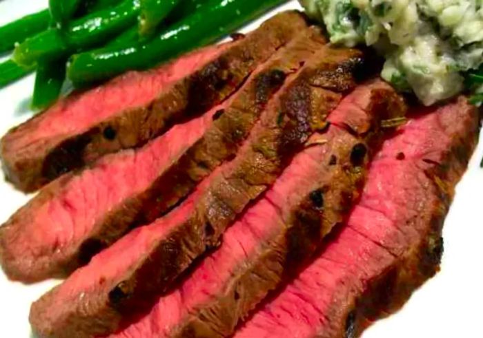 Grilled Flat Iron Steak served with Blue Cheese-Chive Butter