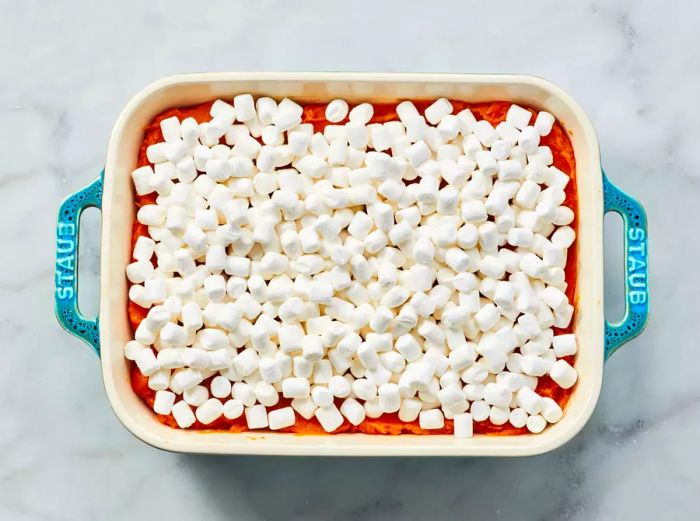 A sweet potato casserole crowned with golden marshmallows.