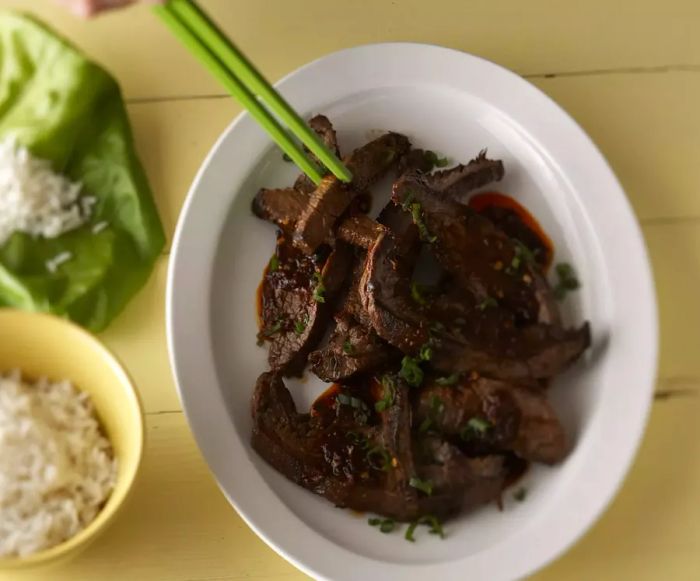 Korean Bulgogi served with white rice and fresh lettuce