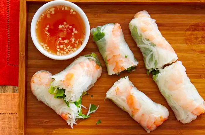 Vietnamese Fresh Spring Rolls served on a wooden board