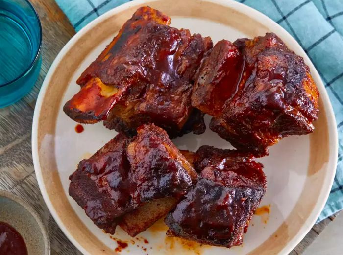 A top-down view of grilled, glazed BBQ ribs.