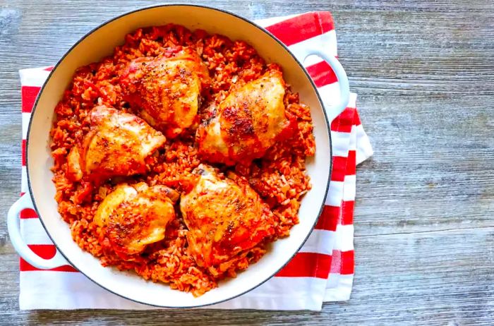 Paprika Chicken Thighs with Rice in a Skillet