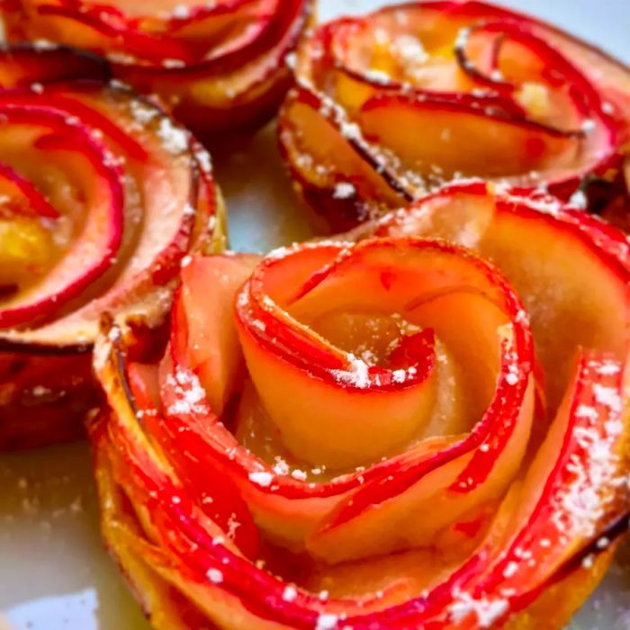 Baked Apple Roses dusted with powdered sugar