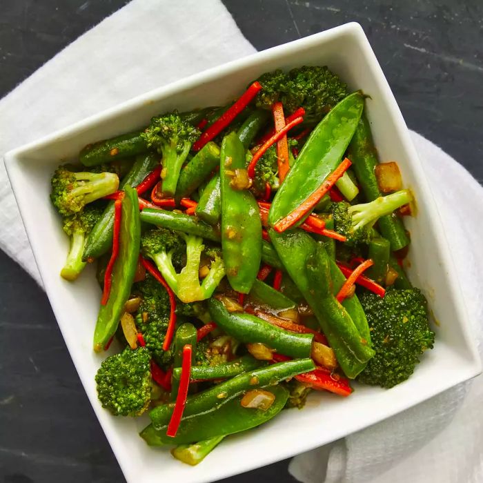 Looking down at a bowl of ginger vegetable stir-fry