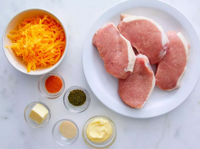 Ingredients arranged in separate dishes, viewed from above