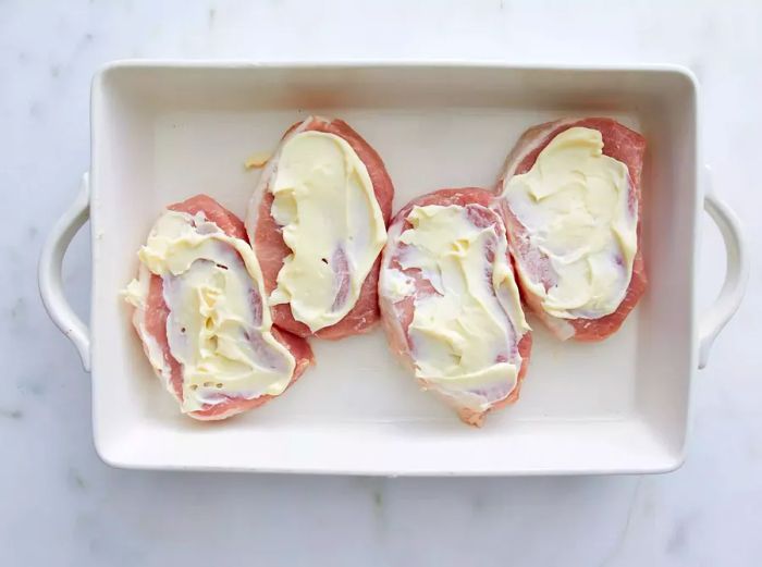 Pork chops with a layer of butter on top