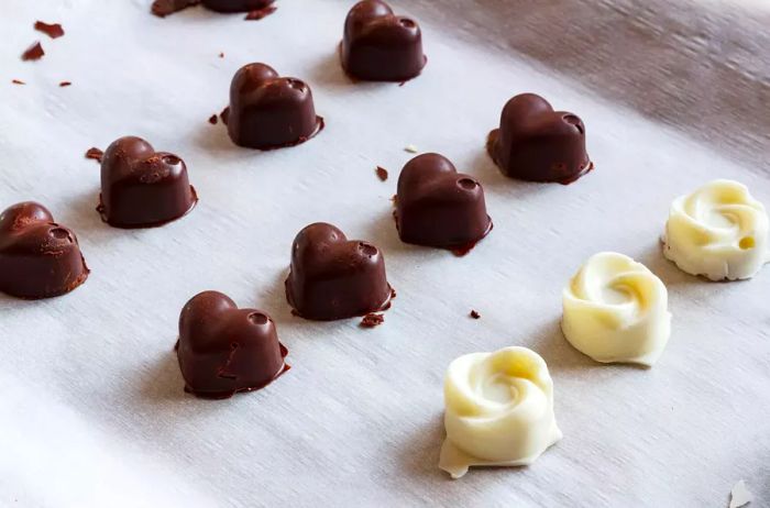 unmolding your homemade filled chocolates before trimming and decorating