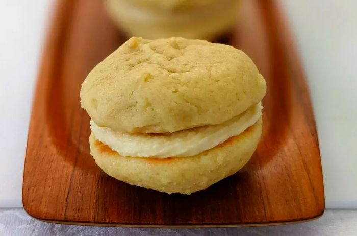 Great-Grandma's Sour Cream Drop Cookies reimagined as lemony whoopie pies filled with rich buttercream