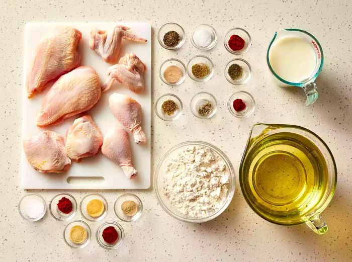 all ingredients ready for preparing buttermilk fried chicken