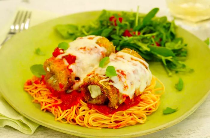 Eggplant Rollatini Served Over Angel Hair Pasta with a Fresh Side Salad