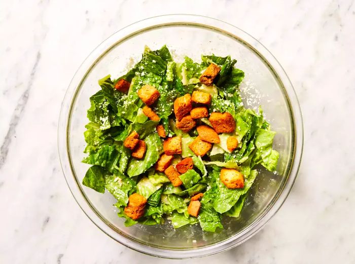 Salad topped with crispy croutons.