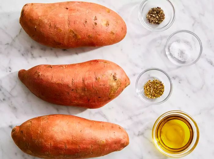 A top-down view of all the ingredients for the Baked Sweet Potatoes recipe.