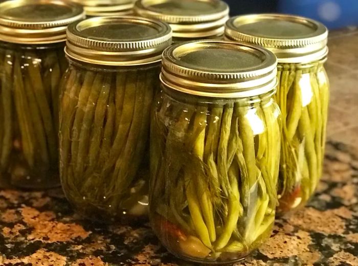 Close-up of Pickled Green Beans in Sealed Jars