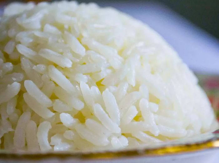 A close-up shot of a bowl filled with Coconut Rice