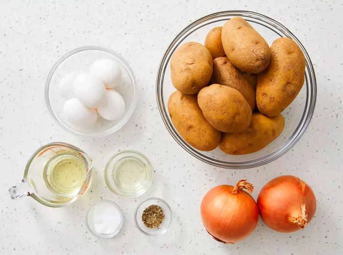 An aerial view showcasing all the ingredients for Potato Kugel