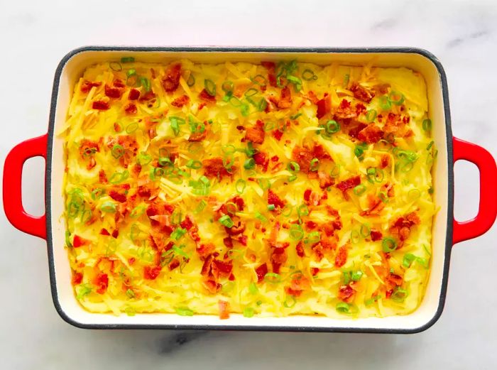 Loaded Baked Potato Casserole fresh out of the oven in a casserole dish