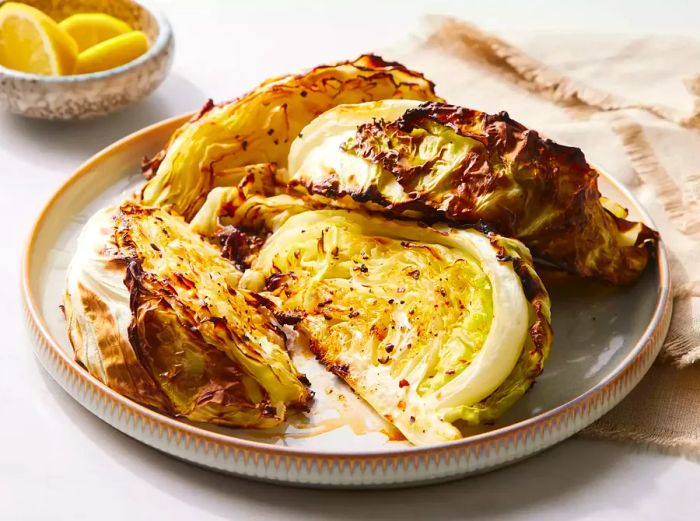 Golden roasted cabbage served on a plate