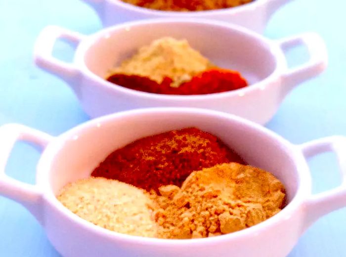 Close-up shot of Tandoori Masala Spice Mix displayed in bowls.