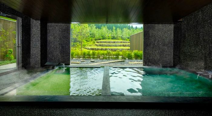 KAI Yufuin is an upscale hot spring ryokan nestled between Mount Yufu and the tranquil rice fields of Oita, offering guests a serene escape.