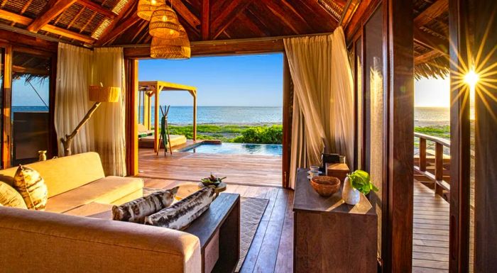 Banyan Tree's Mozambique resort comprises 40 charming thatched-roof villas, each set on a secluded island off the coast of Mozambique, offering a serene, tropical escape.