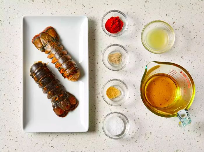 All ingredients prepared for grilling rock lobsters.