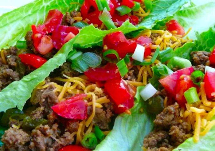 taco filling wrapped in fresh lettuce leaves instead of traditional shells