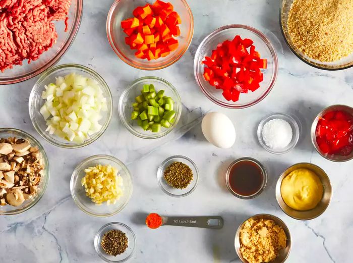 An overhead shot of the ingredients measured and ready to make the meatloaf.