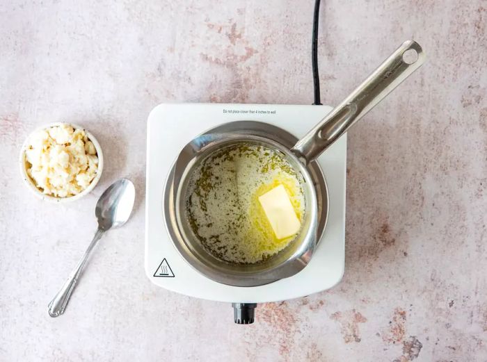 Butter melting in a saucepan.