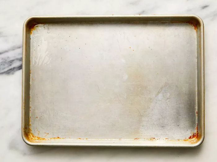 Baking sheet placed on a marble countertop